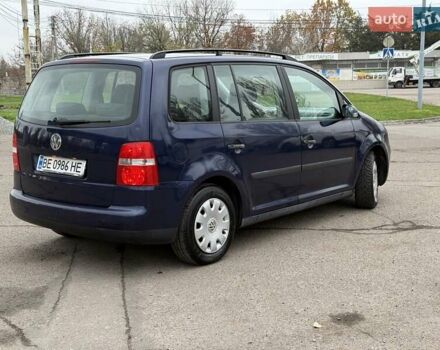 Синий Фольксваген Туран, объемом двигателя 1.6 л и пробегом 246 тыс. км за 5800 $, фото 3 на Automoto.ua