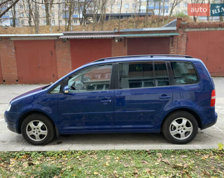 Синий Фольксваген Туран, объемом двигателя 1.6 л и пробегом 199 тыс. км за 6700 $, фото 3 на Automoto.ua