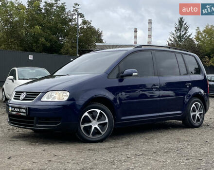 Синий Фольксваген Туран, объемом двигателя 1.6 л и пробегом 233 тыс. км за 6500 $, фото 3 на Automoto.ua