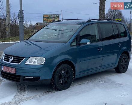 Синий Фольксваген Туран, объемом двигателя 1.6 л и пробегом 186 тыс. км за 6000 $, фото 3 на Automoto.ua