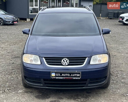 Синий Фольксваген Туран, объемом двигателя 1.6 л и пробегом 233 тыс. км за 6500 $, фото 2 на Automoto.ua