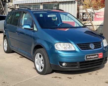 Синій Фольксваген Туран, об'ємом двигуна 2 л та пробігом 320 тис. км за 5490 $, фото 4 на Automoto.ua