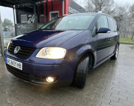 Синий Фольксваген Туран, объемом двигателя 2 л и пробегом 468 тыс. км за 3999 $, фото 2 на Automoto.ua