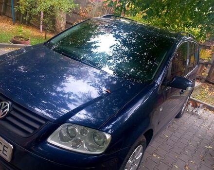 Синий Фольксваген Туран, объемом двигателя 1.6 л и пробегом 220 тыс. км за 6299 $, фото 1 на Automoto.ua