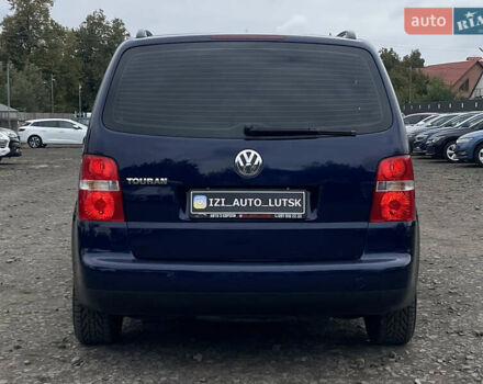 Синий Фольксваген Туран, объемом двигателя 1.6 л и пробегом 233 тыс. км за 6500 $, фото 6 на Automoto.ua