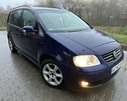 Синий Фольксваген Туран, объемом двигателя 2 л и пробегом 468 тыс. км за 3999 $, фото 1 на Automoto.ua