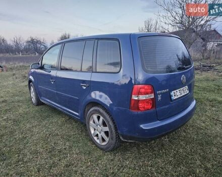 Синий Фольксваген Туран, объемом двигателя 1.9 л и пробегом 273 тыс. км за 5500 $, фото 2 на Automoto.ua