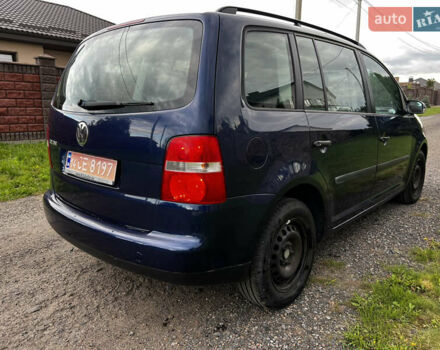 Синий Фольксваген Туран, объемом двигателя 1.6 л и пробегом 200 тыс. км за 5500 $, фото 4 на Automoto.ua