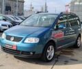 Синий Фольксваген Туран, объемом двигателя 2 л и пробегом 320 тыс. км за 5490 $, фото 1 на Automoto.ua