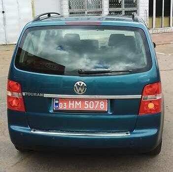 Синий Фольксваген Туран, объемом двигателя 1.6 л и пробегом 180 тыс. км за 6500 $, фото 2 на Automoto.ua