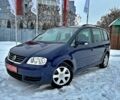 Синій Фольксваген Туран, об'ємом двигуна 1.6 л та пробігом 135 тис. км за 6199 $, фото 1 на Automoto.ua