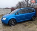 Синий Фольксваген Туран, объемом двигателя 2 л и пробегом 200 тыс. км за 6399 $, фото 2 на Automoto.ua