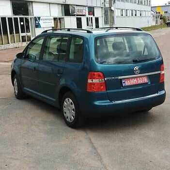 Синий Фольксваген Туран, объемом двигателя 1.6 л и пробегом 180 тыс. км за 6500 $, фото 1 на Automoto.ua