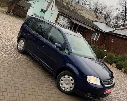 Синий Фольксваген Туран, объемом двигателя 1.6 л и пробегом 204 тыс. км за 6200 $, фото 1 на Automoto.ua