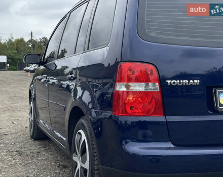 Синий Фольксваген Туран, объемом двигателя 1.6 л и пробегом 233 тыс. км за 6500 $, фото 11 на Automoto.ua