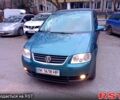 Синій Фольксваген Туран, об'ємом двигуна 2 л та пробігом 232 тис. км за 5450 $, фото 1 на Automoto.ua