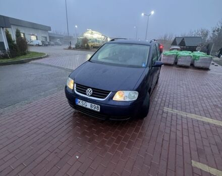 Синий Фольксваген Туран, объемом двигателя 1.9 л и пробегом 400 тыс. км за 2400 $, фото 1 на Automoto.ua