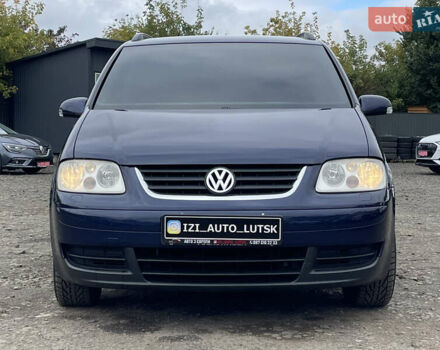 Синий Фольксваген Туран, объемом двигателя 1.6 л и пробегом 233 тыс. км за 6500 $, фото 1 на Automoto.ua