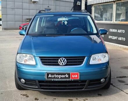 Синій Фольксваген Туран, об'ємом двигуна 2 л та пробігом 320 тис. км за 5490 $, фото 1 на Automoto.ua