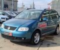 Синій Фольксваген Туран, об'ємом двигуна 2 л та пробігом 320 тис. км за 5490 $, фото 1 на Automoto.ua