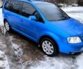 Синій Фольксваген Туран, об'ємом двигуна 2 л та пробігом 220 тис. км за 5550 $, фото 1 на Automoto.ua