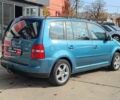Синій Фольксваген Туран, об'ємом двигуна 2 л та пробігом 320 тис. км за 5490 $, фото 6 на Automoto.ua