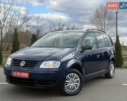 Синій Фольксваген Туран, об'ємом двигуна 1.6 л та пробігом 221 тис. км за 6200 $, фото 5 на Automoto.ua