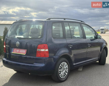 Синій Фольксваген Туран, об'ємом двигуна 1.6 л та пробігом 221 тис. км за 6200 $, фото 11 на Automoto.ua