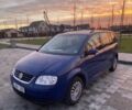 Синий Фольксваген Туран, объемом двигателя 2 л и пробегом 322 тыс. км за 2700 $, фото 1 на Automoto.ua