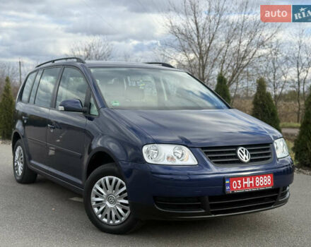Синій Фольксваген Туран, об'ємом двигуна 1.6 л та пробігом 221 тис. км за 6200 $, фото 1 на Automoto.ua