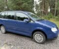 Синій Фольксваген Туран, об'ємом двигуна 2 л та пробігом 224 тис. км за 4950 $, фото 1 на Automoto.ua