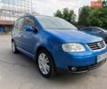 Синий Фольксваген Туран, объемом двигателя 2 л и пробегом 307 тыс. км за 5800 $, фото 1 на Automoto.ua