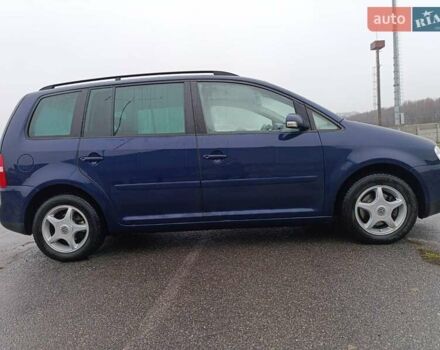 Синий Фольксваген Туран, объемом двигателя 1.6 л и пробегом 227 тыс. км за 5999 $, фото 4 на Automoto.ua