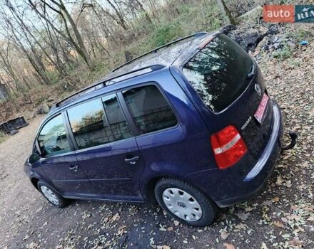 Синий Фольксваген Туран, объемом двигателя 1.6 л и пробегом 223 тыс. км за 6200 $, фото 2 на Automoto.ua