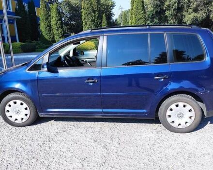 Синий Фольксваген Туран, объемом двигателя 1.39 л и пробегом 241 тыс. км за 6000 $, фото 2 на Automoto.ua