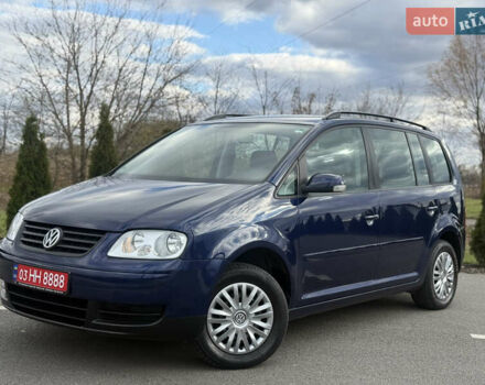 Синій Фольксваген Туран, об'ємом двигуна 1.6 л та пробігом 221 тис. км за 6200 $, фото 4 на Automoto.ua
