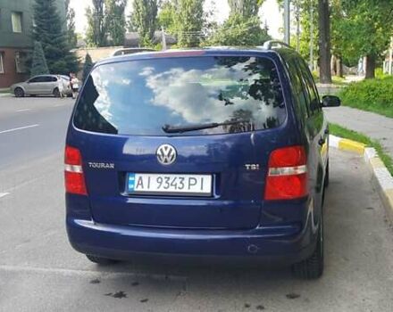 Синий Фольксваген Туран, объемом двигателя 1.4 л и пробегом 261 тыс. км за 6200 $, фото 7 на Automoto.ua