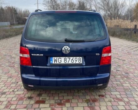 Синий Фольксваген Туран, объемом двигателя 1.9 л и пробегом 322 тыс. км за 3900 $, фото 1 на Automoto.ua