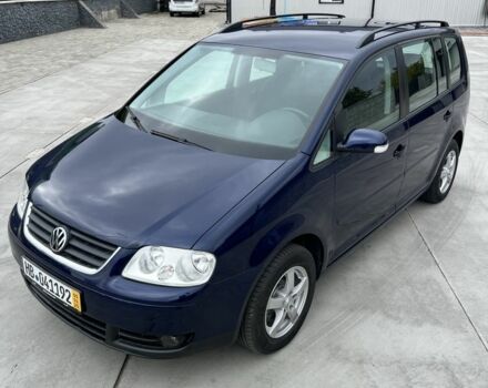 Синий Фольксваген Туран, объемом двигателя 1.6 л и пробегом 247 тыс. км за 7200 $, фото 1 на Automoto.ua