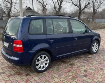 Синий Фольксваген Туран, объемом двигателя 1.9 л и пробегом 322 тыс. км за 3900 $, фото 2 на Automoto.ua
