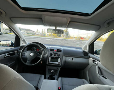 Синий Фольксваген Туран, объемом двигателя 1.4 л и пробегом 205 тыс. км за 7299 $, фото 19 на Automoto.ua