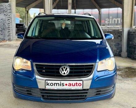Синий Фольксваген Туран, объемом двигателя 1.4 л и пробегом 241 тыс. км за 6399 $, фото 4 на Automoto.ua