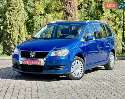 Синий Фольксваген Туран, объемом двигателя 1.4 л и пробегом 260 тыс. км за 6750 $, фото 4 на Automoto.ua