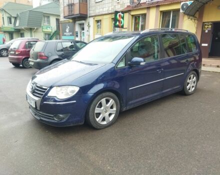 Синий Фольксваген Туран, объемом двигателя 2 л и пробегом 244 тыс. км за 5350 $, фото 1 на Automoto.ua