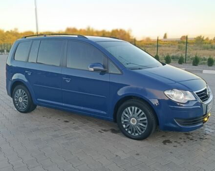 Синий Фольксваген Туран, объемом двигателя 1.4 л и пробегом 250 тыс. км за 5900 $, фото 2 на Automoto.ua