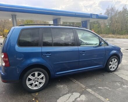 Синий Фольксваген Туран, объемом двигателя 1.6 л и пробегом 246 тыс. км за 7450 $, фото 1 на Automoto.ua