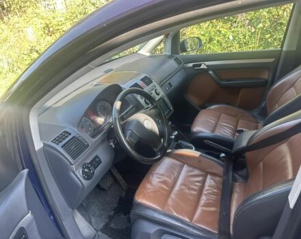 Синий Фольксваген Туран, объемом двигателя 2 л и пробегом 244 тыс. км за 5350 $, фото 6 на Automoto.ua