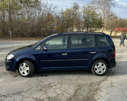 Синий Фольксваген Туран, объемом двигателя 1.4 л и пробегом 237 тыс. км за 6000 $, фото 4 на Automoto.ua