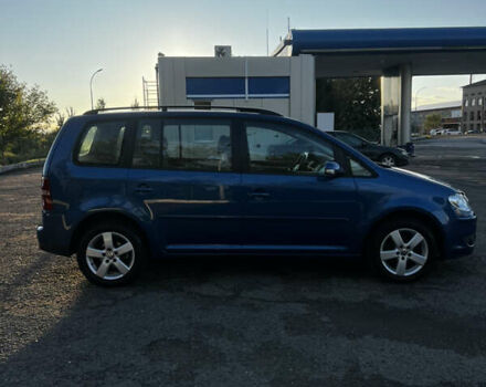 Синий Фольксваген Туран, объемом двигателя 1.4 л и пробегом 205 тыс. км за 7299 $, фото 4 на Automoto.ua