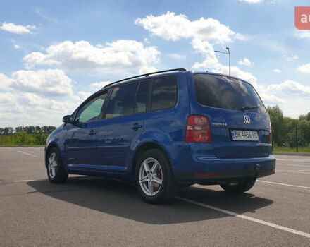 Синій Фольксваген Туран, об'ємом двигуна 1.4 л та пробігом 280 тис. км за 5888 $, фото 11 на Automoto.ua